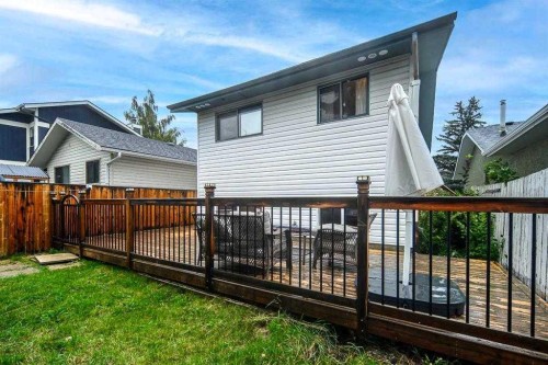 68 Woodglen Close Sw, Calgary, AB - Outdoor With Deck Patio Veranda With Exterior
