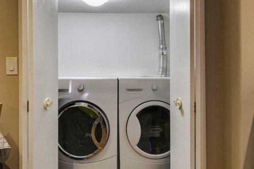 68 Woodglen Close Sw, Calgary, AB - Indoor Photo Showing Laundry Room