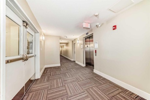 103-10 Auburn Bay Link Se, Calgary, AB - Indoor Photo Showing Other Room