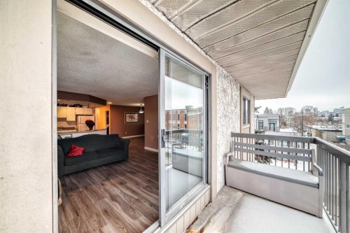 302-2611 1 Avenue Nw, Calgary, AB - Outdoor With Balcony With Exterior