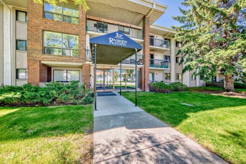 302-2611 1 Avenue Nw, Calgary, AB - Outdoor With Balcony With Facade