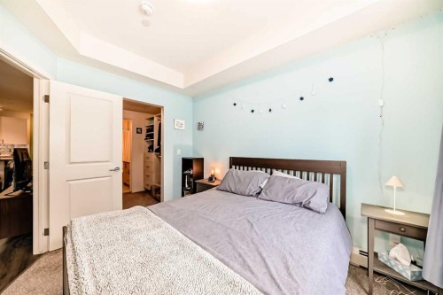 8210-151 Legacy Main Street Se, Calgary, AB - Indoor Photo Showing Bedroom