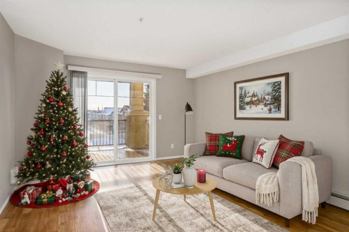 1331-8810 Royal Birch Boulevard Nw, Calgary, AB - Indoor Photo Showing Living Room