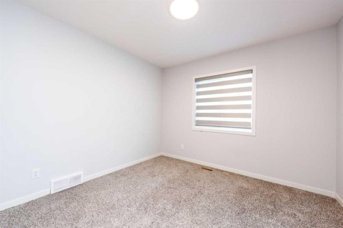 97 Cornerbrook Road Ne, Calgary, AB - Indoor Photo Showing Other Room