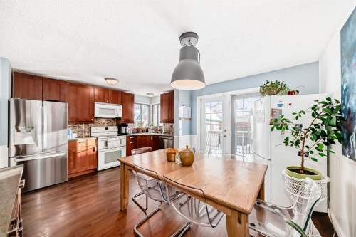 35 Macewan Drive Nw, Calgary, AB - Indoor Photo Showing Kitchen With Double Sink
