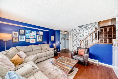35 Macewan Drive Nw, Calgary, AB - Indoor Photo Showing Living Room