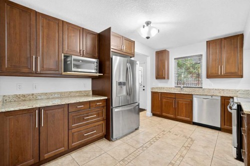 2831 Brecken Road Nw, Calgary, AB - Indoor Photo Showing Kitchen With Stainless Steel Kitchen