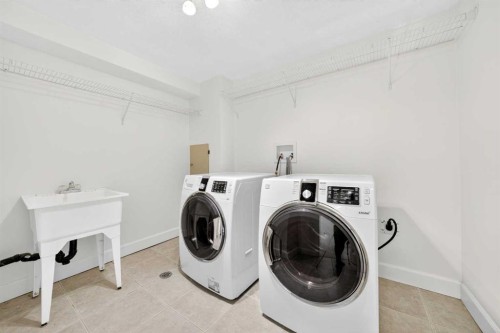 2831 Brecken Road Nw, Calgary, AB - Indoor Photo Showing Laundry Room