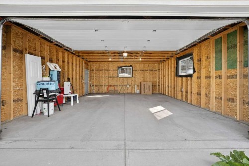 2831 Brecken Road Nw, Calgary, AB - Indoor Photo Showing Garage