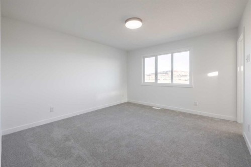 19 Appaloosa Way, Cochrane, AB - Indoor Photo Showing Other Room