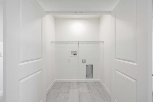 19 Appaloosa Way, Cochrane, AB - Indoor Photo Showing Other Room