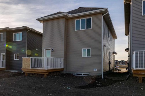 19 Appaloosa Way, Cochrane, AB - Outdoor With Exterior