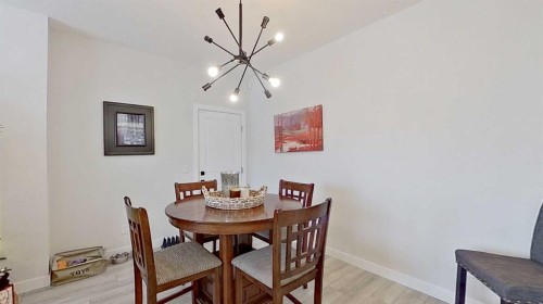 184 Emberside Place, Cochrane, AB - Indoor Photo Showing Dining Room