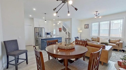 184 Emberside Place, Cochrane, AB - Indoor Photo Showing Dining Room