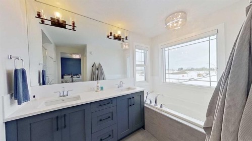 184 Emberside Place, Cochrane, AB - Indoor Photo Showing Bathroom
