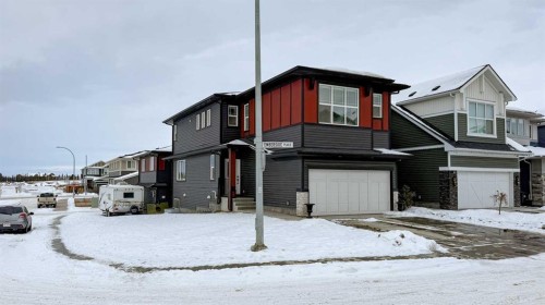 184 Emberside Place, Cochrane, AB - Outdoor With Facade