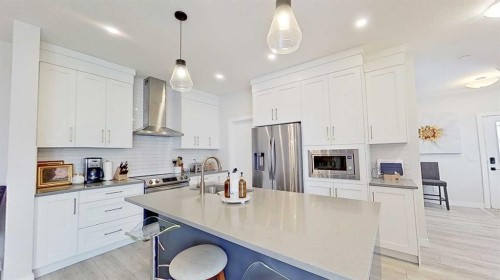 184 Emberside Place, Cochrane, AB - Indoor Photo Showing Kitchen With Upgraded Kitchen