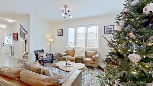 184 Emberside Place, Cochrane, AB - Indoor Photo Showing Living Room