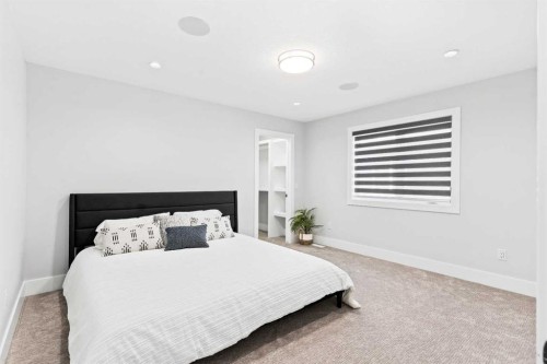 16 Sunvalley View, Cochrane, AB - Indoor Photo Showing Bedroom