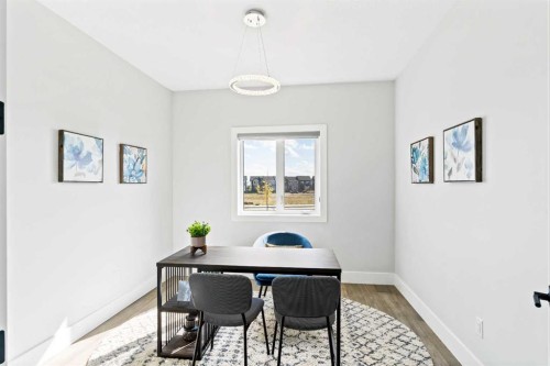 16 Sunvalley View, Cochrane, AB - Indoor Photo Showing Dining Room