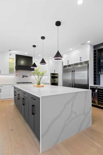 21 Sunvalley View, Cochrane, AB - Indoor Photo Showing Kitchen With Upgraded Kitchen