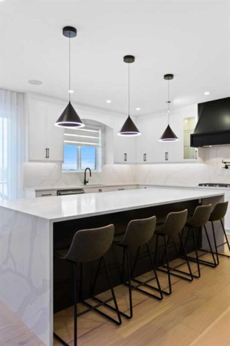 21 Sunvalley View, Cochrane, AB - Indoor Photo Showing Kitchen With Upgraded Kitchen