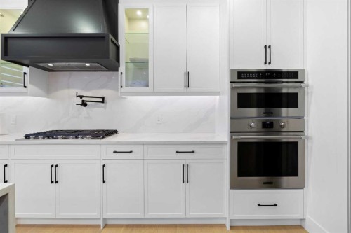 21 Sunvalley View, Cochrane, AB - Indoor Photo Showing Kitchen