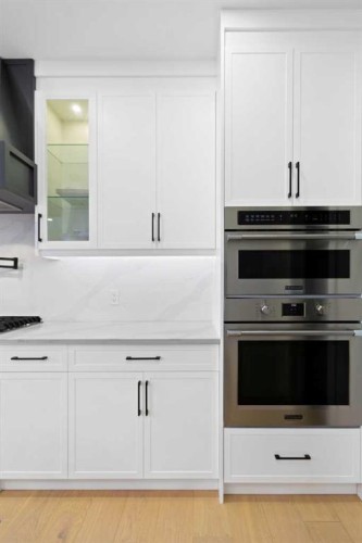 21 Sunvalley View, Cochrane, AB - Indoor Photo Showing Kitchen