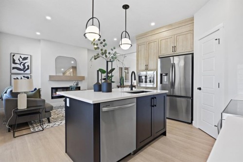 56 Fireside Common, Cochrane, AB - Indoor Photo Showing Kitchen With Upgraded Kitchen