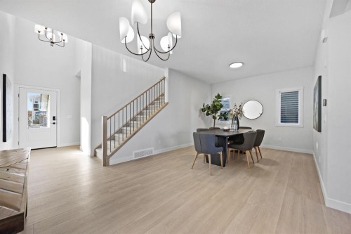 56 Fireside Common, Cochrane, AB - Indoor Photo Showing Dining Room