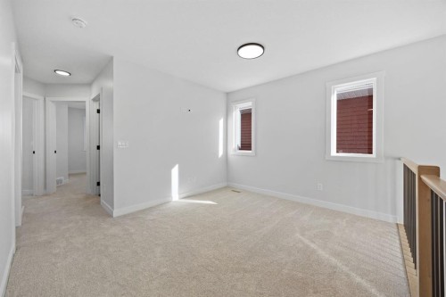 56 Fireside Common, Cochrane, AB - Indoor Photo Showing Other Room