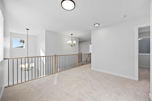 56 Fireside Common, Cochrane, AB - Indoor Photo Showing Other Room