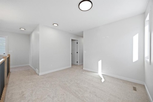 56 Fireside Common, Cochrane, AB - Indoor Photo Showing Other Room