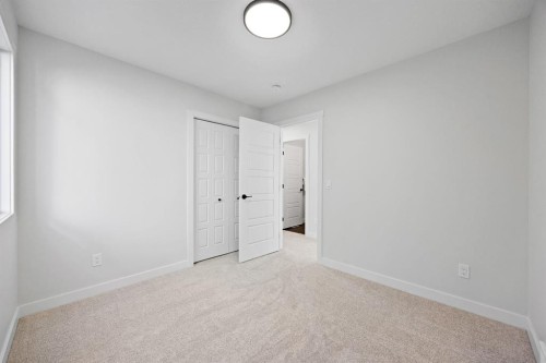 56 Fireside Common, Cochrane, AB - Indoor Photo Showing Other Room