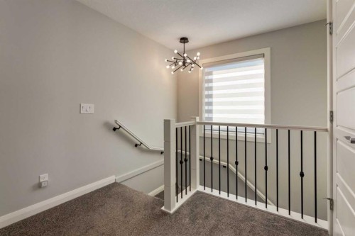 57 Evansfield Gate Nw, Calgary, AB - Indoor Photo Showing Other Room