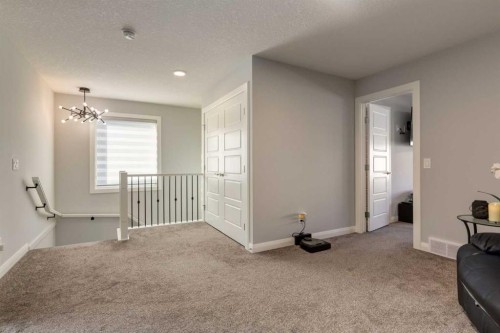 57 Evansfield Gate Nw, Calgary, AB - Indoor Photo Showing Other Room