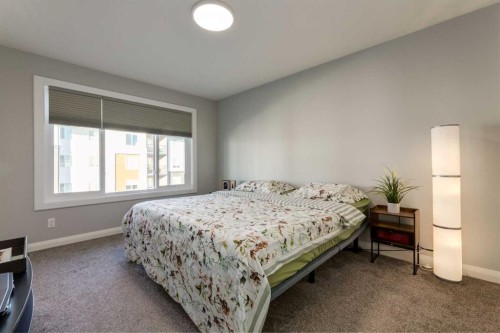 57 Evansfield Gate Nw, Calgary, AB - Indoor Photo Showing Bedroom