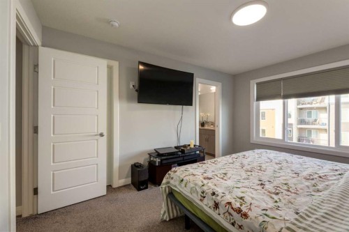 57 Evansfield Gate Nw, Calgary, AB - Indoor Photo Showing Bedroom
