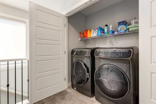 57 Evansfield Gate Nw, Calgary, AB - Indoor Photo Showing Laundry Room