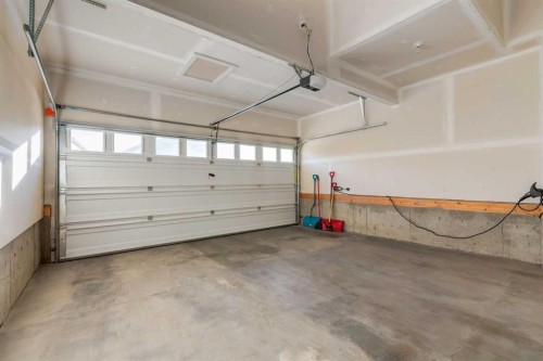 57 Evansfield Gate Nw, Calgary, AB - Indoor Photo Showing Garage