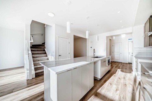 115 Mercado Crescent Se, Calgary, AB - Indoor Photo Showing Kitchen With Upgraded Kitchen