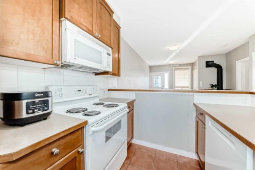 309-1540 17 Avenue Sw, Calgary, AB - Indoor Photo Showing Kitchen