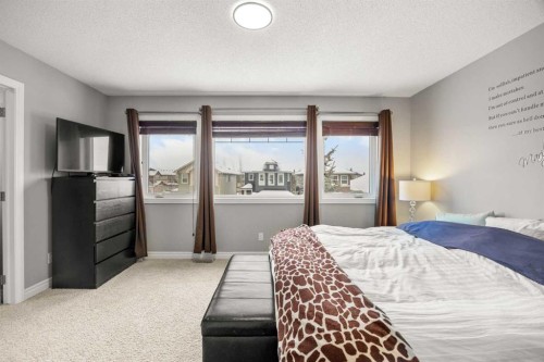 240 Evanspark Gardens Nw, Calgary, AB - Indoor Photo Showing Bedroom