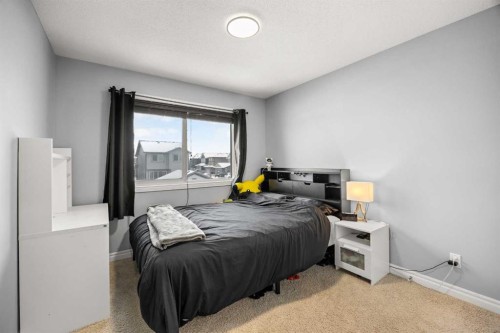 240 Evanspark Gardens Nw, Calgary, AB - Indoor Photo Showing Bedroom