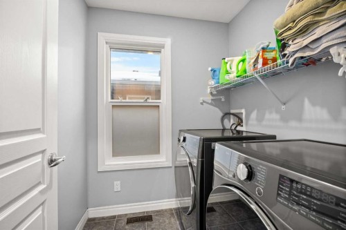 240 Evanspark Gardens Nw, Calgary, AB - Indoor Photo Showing Laundry Room