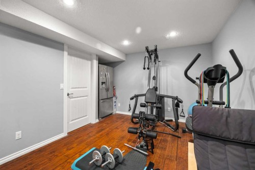 240 Evanspark Gardens Nw, Calgary, AB - Indoor Photo Showing Gym Room