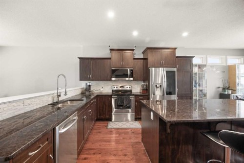 240 Evanspark Gardens Nw, Calgary, AB - Indoor Photo Showing Kitchen With Stainless Steel Kitchen With Upgraded Kitchen