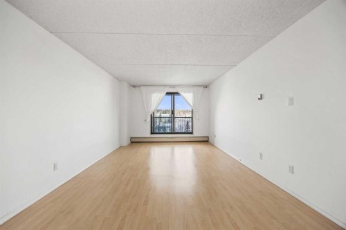 514-5204 Dalton Drive Nw, Calgary, AB - Indoor Photo Showing Other Room