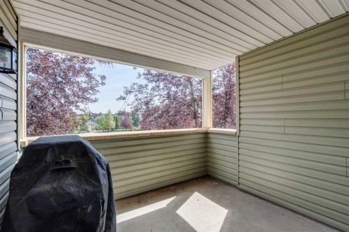 2203-4 Kingsland Close Se, Airdrie, AB - Outdoor With Exterior