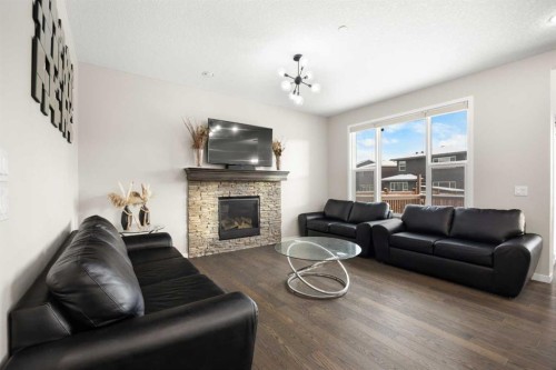 134 Howse Rise Ne, Calgary, AB - Indoor Photo Showing Living Room With Fireplace